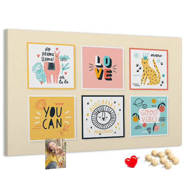 Korktafel mit farbenfrohen Grafiken und positiven Slogans