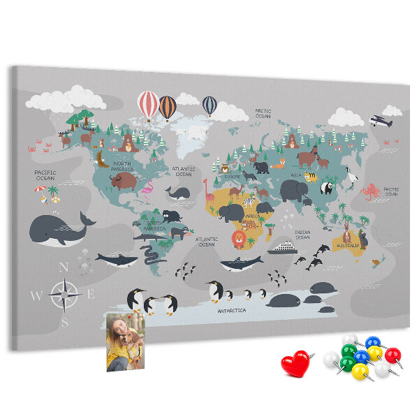 Weltkarte mit Tierillustrationen auf Korkrückwand