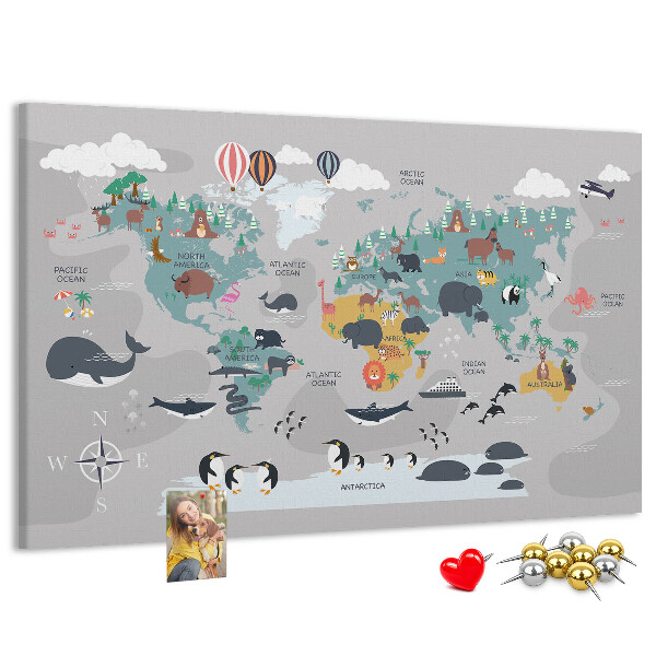 Weltkarte mit Tierillustrationen auf Korkrückwand