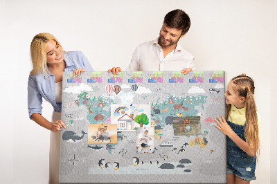 Weltkarte mit Tierillustrationen auf Korkrückwand