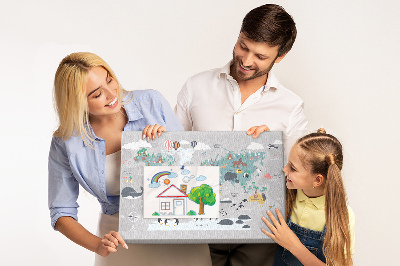Weltkarte mit Tierillustrationen auf Korkrückwand