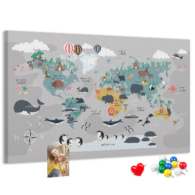 Weltkarte mit Tierillustrationen auf Korkrückwand