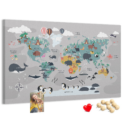 Weltkarte mit Tierillustrationen auf Korkrückwand