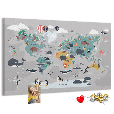 Weltkarte mit Tierillustrationen auf Korkrückwand