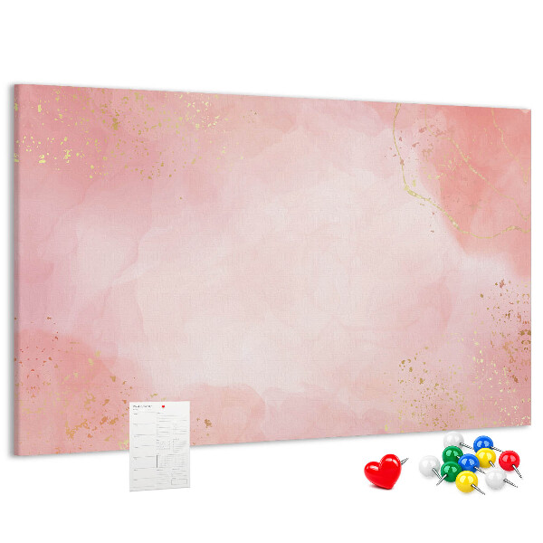 Korktafel mit rosa Hintergrund und zarten Goldakzenten