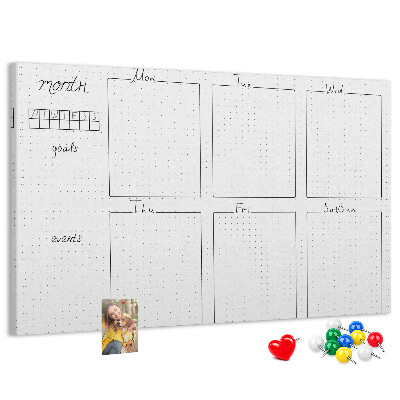 Planer mit Raster und Korkrückwand zur Organisation Ihrer Zeit