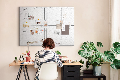 Planer mit Raster und Korkrückwand zur Organisation Ihrer Zeit