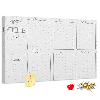 Planer mit Raster und Korkrückwand zur Organisation Ihrer Zeit