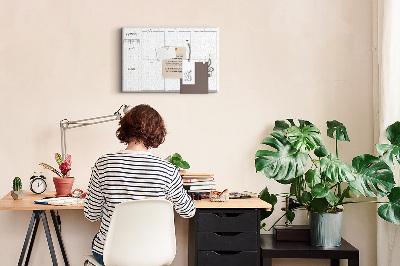 Planer mit Raster und Korkrückwand zur Organisation Ihrer Zeit
