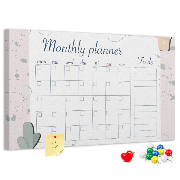 Korktafel mit Pflanzenmotiven als Monatsplaner