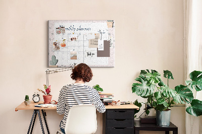 Korktafel mit Pflanzenmotiven als Monatsplaner
