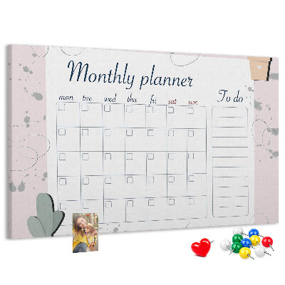 Korktafel mit Pflanzenmotiven als Monatsplaner