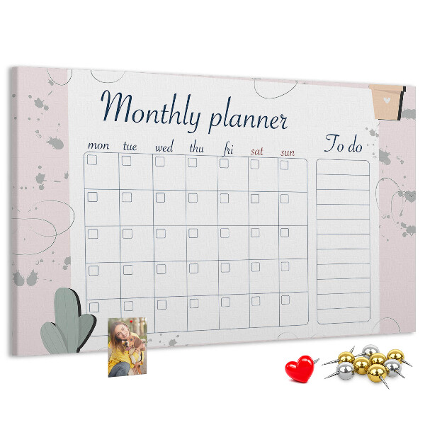 Korktafel mit Pflanzenmotiven als Monatsplaner