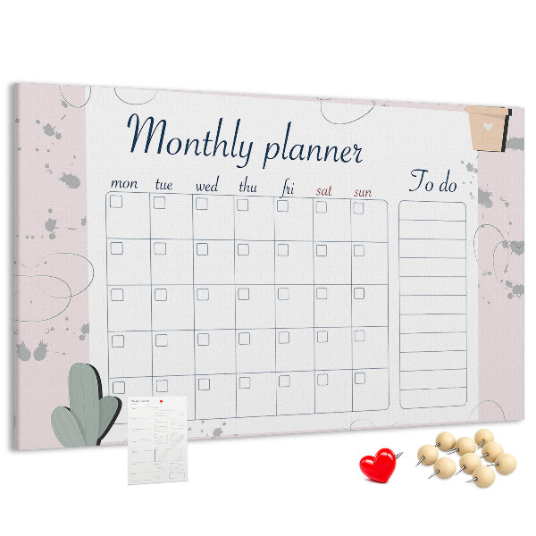 Korktafel mit Pflanzenmotiven als Monatsplaner