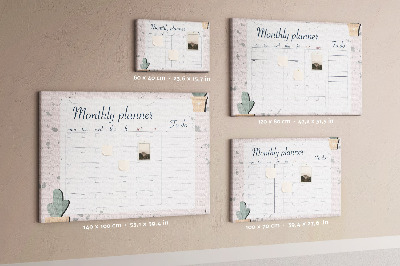Korktafel mit Pflanzenmotiven als Monatsplaner