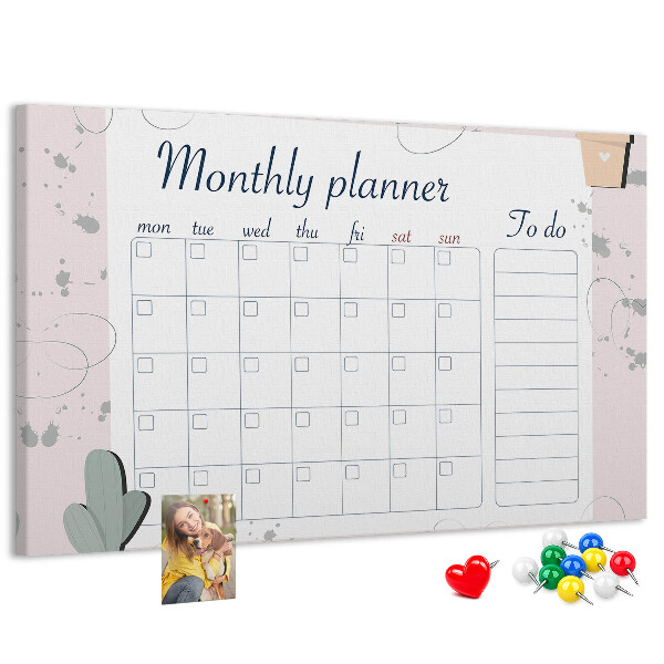 Korktafel mit Pflanzenmotiven als Monatsplaner