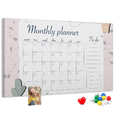 Korktafel mit Pflanzenmotiven als Monatsplaner