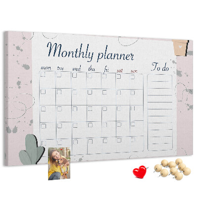 Korktafel mit Pflanzenmotiven als Monatsplaner