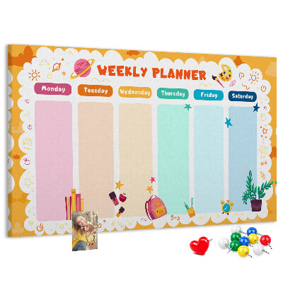 Korktafel mit farbenfrohem Schulmotiv als Wochenplaner