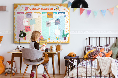 Korktafel mit farbenfrohem Schulmotiv als Wochenplaner