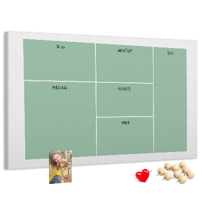 Kork-Pinnwand zur Organisation von Aufgaben in Tabellenform
