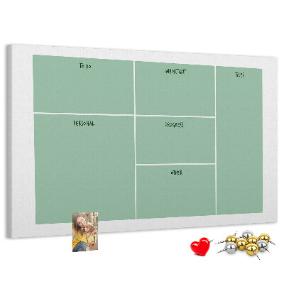 Kork-Pinnwand zur Organisation von Aufgaben in Tabellenform