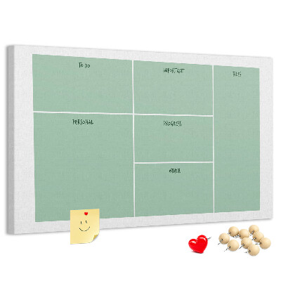 Kork-Pinnwand zur Organisation von Aufgaben in Tabellenform