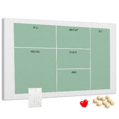 Kork-Pinnwand zur Organisation von Aufgaben in Tabellenform