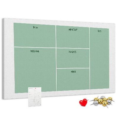 Kork-Pinnwand zur Organisation von Aufgaben in Tabellenform