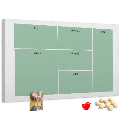 Kork-Pinnwand zur Organisation von Aufgaben in Tabellenform