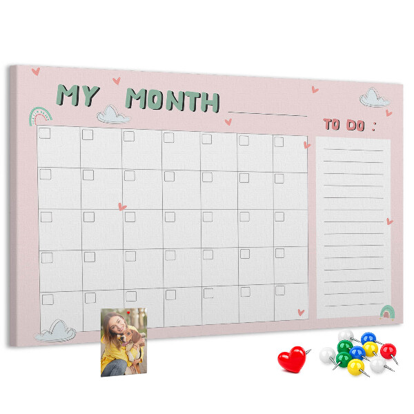 Korktafel rosa Kalender mit Wolken und Herzen