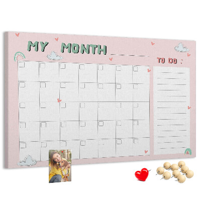 Korktafel rosa Kalender mit Wolken und Herzen