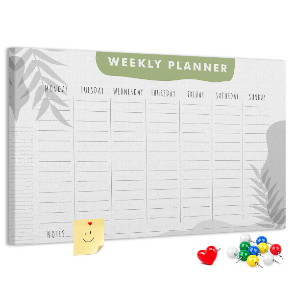 Korktafel mit Wochenplaner und Pflanzenmotiv