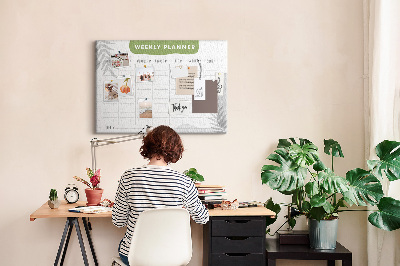 Korktafel mit Wochenplaner und Pflanzenmotiv