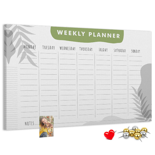 Korktafel mit Wochenplaner und Pflanzenmotiv
