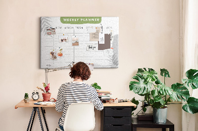Korktafel mit Wochenplaner und Pflanzenmotiv