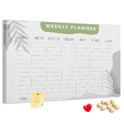 Korktafel mit Wochenplaner und Pflanzenmotiv