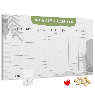 Korktafel mit Wochenplaner und Pflanzenmotiv