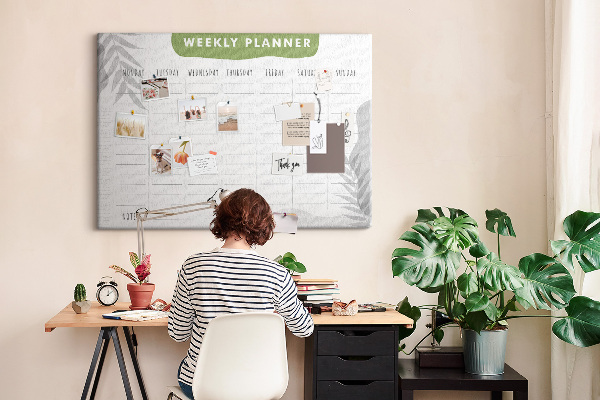 Korktafel mit Wochenplaner und Pflanzenmotiv