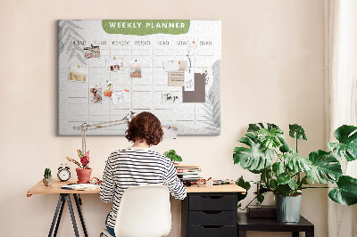 Korktafel mit Wochenplaner und Pflanzenmotiv