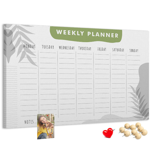 Korktafel mit Wochenplaner und Pflanzenmotiv