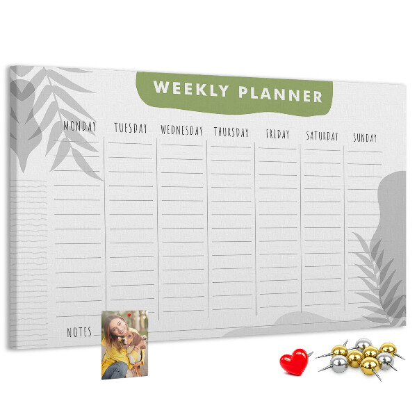 Korktafel mit Wochenplaner und Pflanzenmotiv