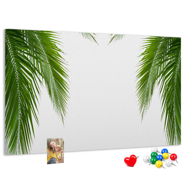 Korkbild mit Palmenblättern auf weißem Hintergrund