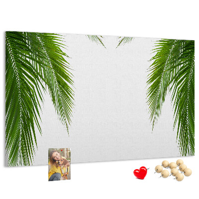 Korkbild mit Palmenblättern auf weißem Hintergrund