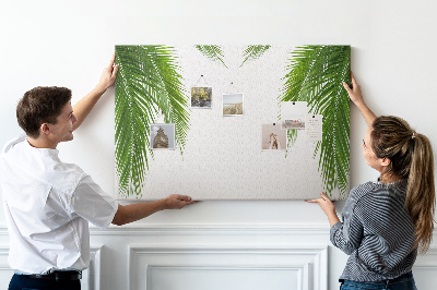Korkbild mit Palmenblättern auf weißem Hintergrund