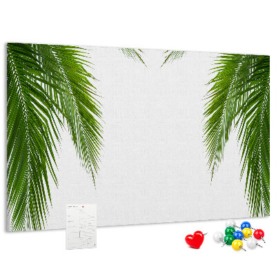 Korkbild mit Palmenblättern auf weißem Hintergrund