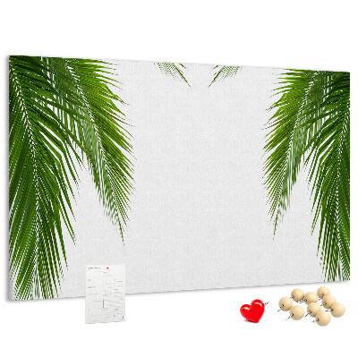 Korkbild mit Palmenblättern auf weißem Hintergrund