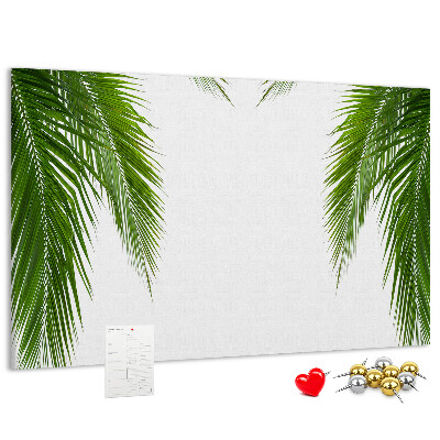 Korkbild mit Palmenblättern auf weißem Hintergrund