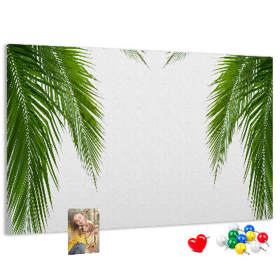 Korkbild mit Palmenblättern auf weißem Hintergrund