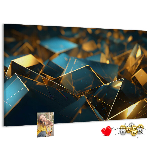 Korkpinnwand mit goldenen und blauen geometrischen Formen